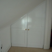 Loft conversion painted bespoke cupboard