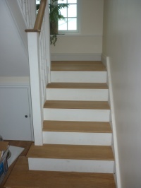 Oak and Painted Staircase with bespoke square bottom tread